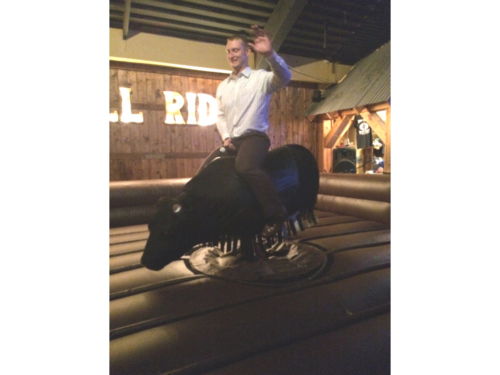 Chris Lowe tries his hand at bull riding