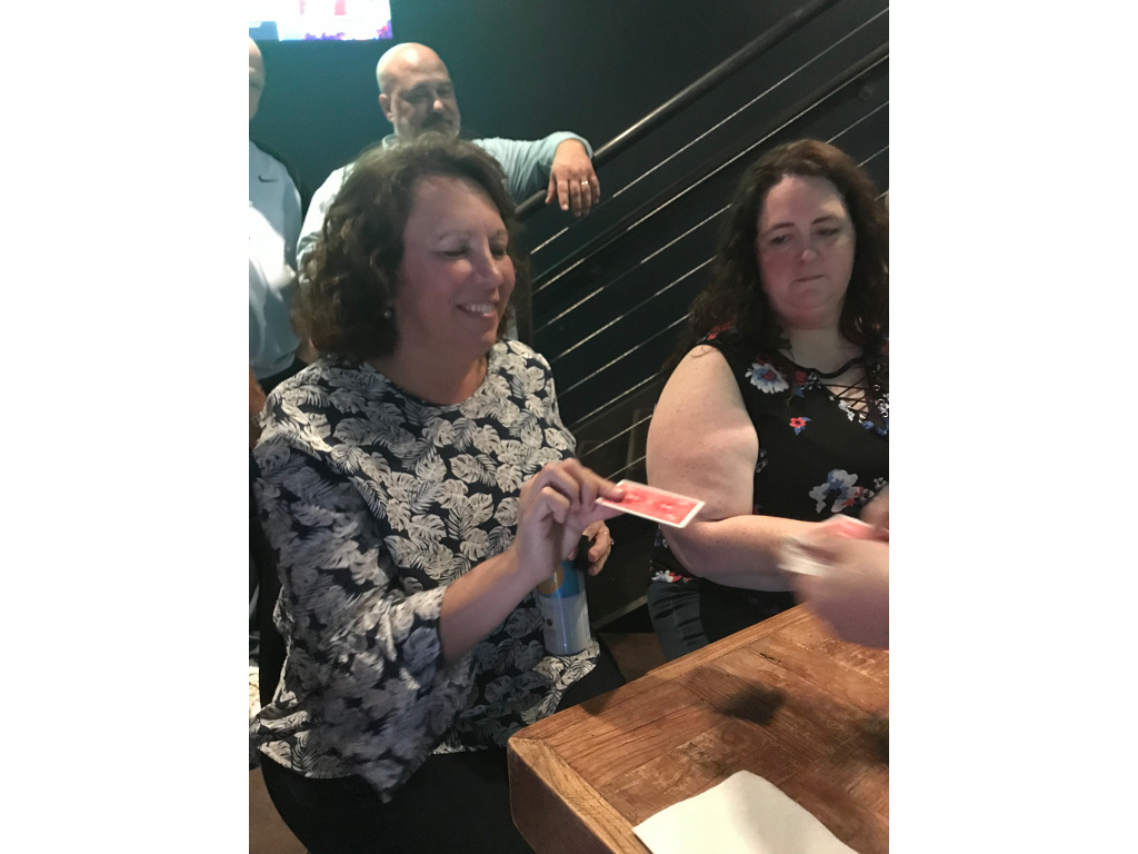 Christa picks a card